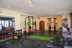 a gym with several equipment in a room at Thanh Lich Royal Boutique in Hue