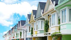 a row of houses on a city street at M&B Tropical 3-Bedroom Townhouse at PonteFino Prime in Batangas City