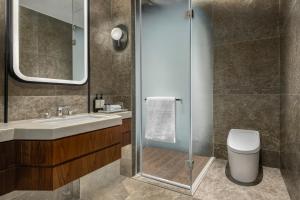 Un baño de Vignette Collection Shanghai Snow World Hotel by IHG
