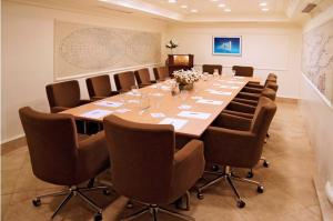 a large conference room with a long table and chairs at Hotel Gelibolu in Gelibolu