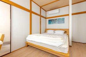 Fukurou House房間的床