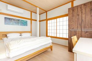 Fukurou House房間的床