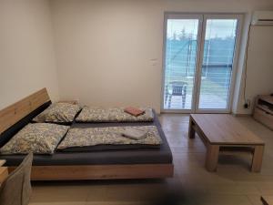 Posteľ alebo postele v izbe v ubytovaní Apartmán Neva Galanta