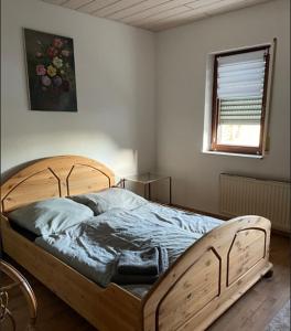 Ένα ή περισσότερα κρεβάτια σε δωμάτιο στο Ferienhaus