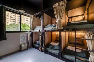 Postel nebo postele na pokoji v ubytování Getcha Hostel + 37 fotografií