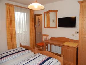 TV a/nebo společenská místnost v ubytování Haus Seehof
