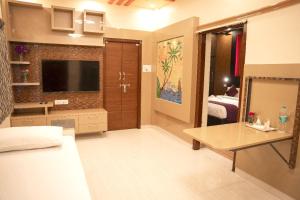 TV a/nebo společenská místnost v ubytování Sky Stay Resorts