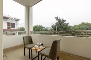 Balkón nebo terasa v ubytování Aadat Hotel Subhash Chowk Gurgaon