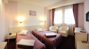 TV a/nebo společenská místnost v ubytování Hotel Nevis Wellness & SPA