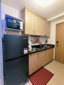 Kuchyň nebo kuchyňský kout v ubytování Shore 2 Tower 3 Modern Loft Near Mall of Asia