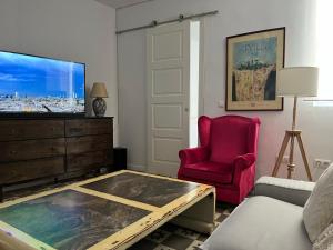 Телевизор и/или развлекательный центр в La Casita Boutique San Andrés