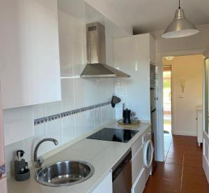 Kuchyň nebo kuchyňský kout v ubytování Apartamento Aventuras