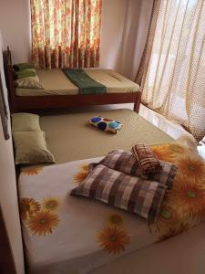 Postel nebo postele na pokoji v ubytování Room in BB - Aremen Transient, Nipa Hut