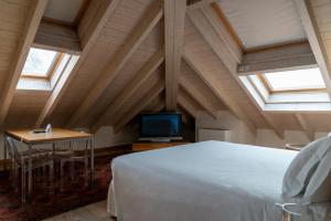 Postel nebo postele na pokoji v ubytování Art Hotel Varese