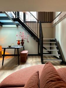 Гостиная зона в Loft Apartment City Stay & Go Enschede +19 фотографий