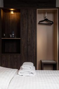 Łóżko lub łóżka w pokoju w obiekcie Hotel Grunt