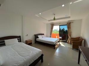 Postel nebo postele na pokoji v ubytování Relaxation guesthouse