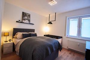 Postel nebo postele na pokoji v ubytování Ferienwohnung FLORA - Meschede