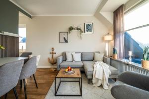 Posezení v ubytování Haus Am Anker Wohnung 7