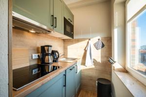 Kuchyň nebo kuchyňský kout v ubytování Haus Am Anker Wohnung 7 + 13 fotografií