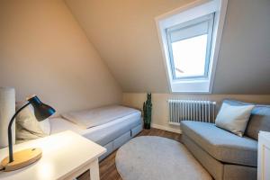 Posezení v ubytování Haus Am Anker Wohnung 7