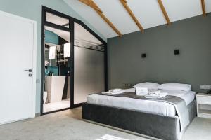 Postel nebo postele na pokoji v ubytování Ariam Boutique Hotel