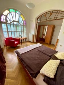 Postel nebo postele na pokoji v ubytování Vila Olomouc
