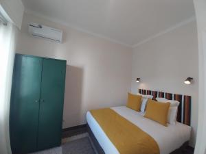 Ein Bett oder Betten in einem Zimmer der Unterkunft Suite Balima XI