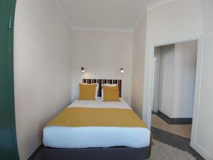 Ein Bett oder Betten in einem Zimmer der Unterkunft Suite Balima XI
