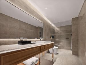 Koupelna v ubytování DoubleTree by Hilton Weihai