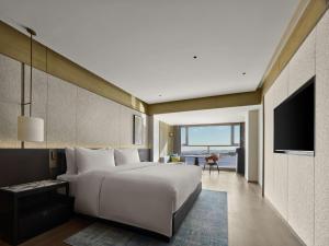 TV a/nebo společenská místnost v ubytování DoubleTree by Hilton Weihai