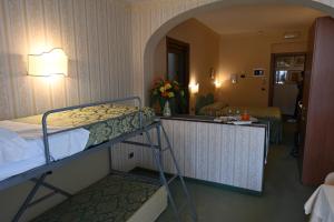 Postel nebo postele na pokoji v ubytování Hotel Ristorante La Lanterna