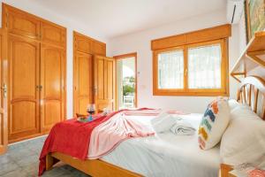 Łóżko lub łóżka w pokoju w obiekcie Villa Lehman - PlusHolidays