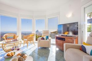 Telewizja i/lub zestaw kina domowego w obiekcie Villa Lehman - PlusHolidays