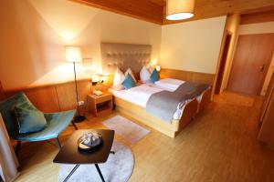 Postel nebo postele na pokoji v ubytování Hotel Zollner