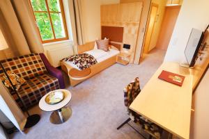 Postel nebo postele na pokoji v ubytování Hotel Zollner