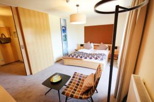 Postel nebo postele na pokoji v ubytování Hotel Zollner