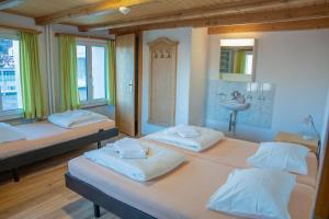 Letto o letti in una camera di juhui Flumserberg