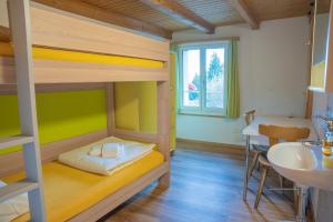 Letto o letti in una camera di juhui Flumserberg