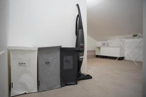 a room with a table and a computer monitor at casa vacanze LE PLEIADI in Diano Marina