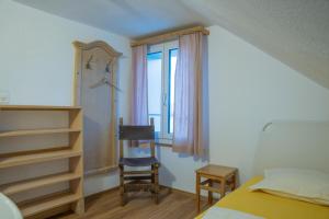 Letto o letti in una camera di juhui Flumserberg
