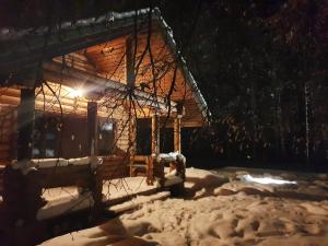 Poilsio ir sveikatinimo sodyba Pušų Šlamesy v zimě