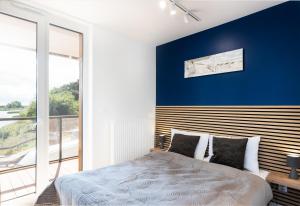 Postel nebo postele na pokoji v ubytování Apartament Lighthouse 06 SurfingBird Mrzeżyno