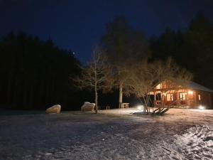 Poilsio ir sveikatinimo sodyba Pušų Šlamesy v zimě