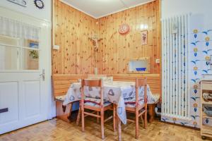 Photo de la galerie de l'établissement Ciasa Micelin - Appartamento Clara, à Pozza di Fassa