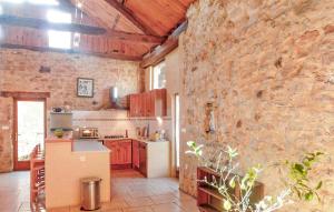 Kuchyň nebo kuchyňský kout v ubytování La Grange Aux Noix + 29 fotografií