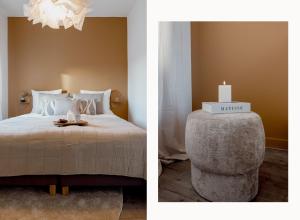 Un pat sau paturi într-o cameră la Ruim 2 slaapkamer appartement met xl dakterras +2 fotografii