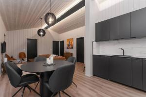Cozy and Modern Cabins in Selfoss的电视和/或娱乐中心