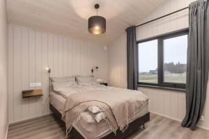 Cozy and Modern Cabins in Selfoss客房内的一张或多张床位