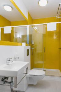 Kúpeľňa v ubytovaní Hotel Willa Odkrywców